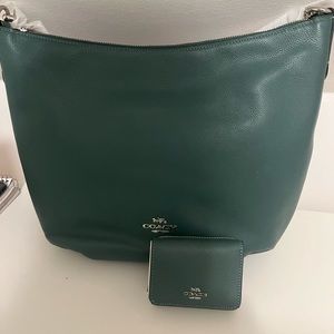Brand new Coach bag with wallet and tags are included.
